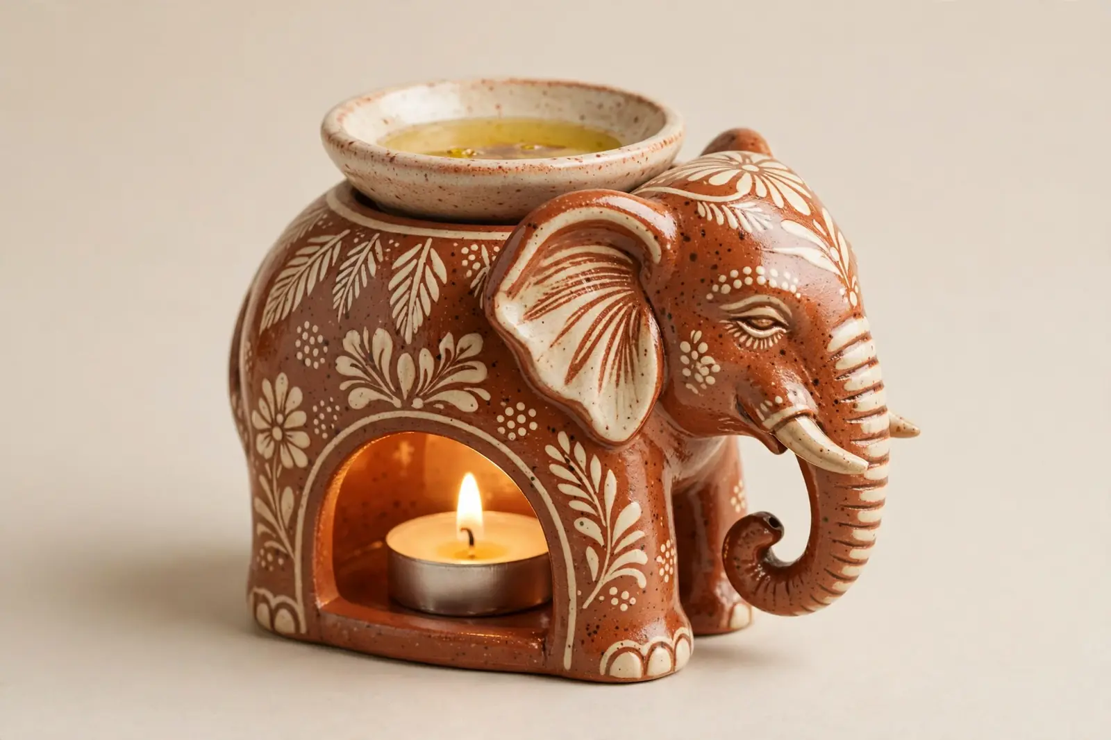 Oil Burner — Elephant: the elephant oil burner with tealight chamber and oil dish above